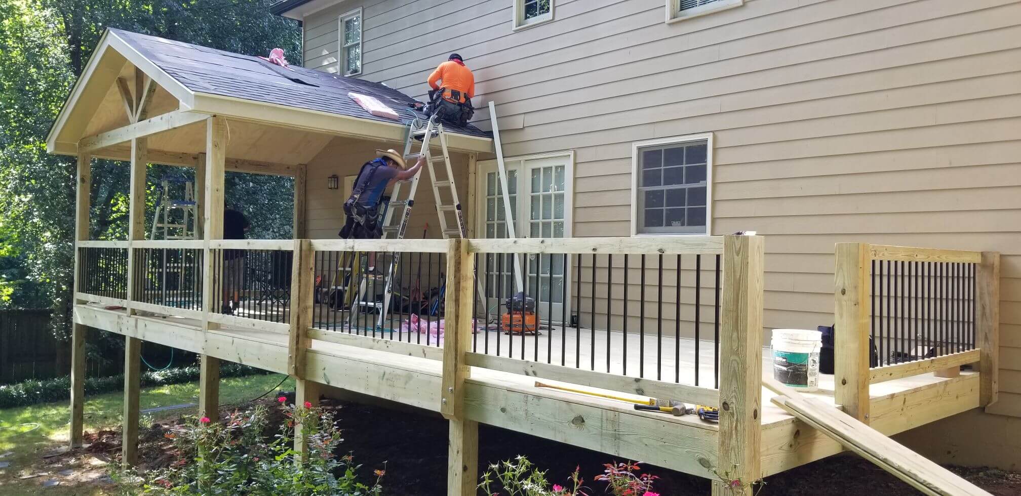 Crew working on residential roof replacement